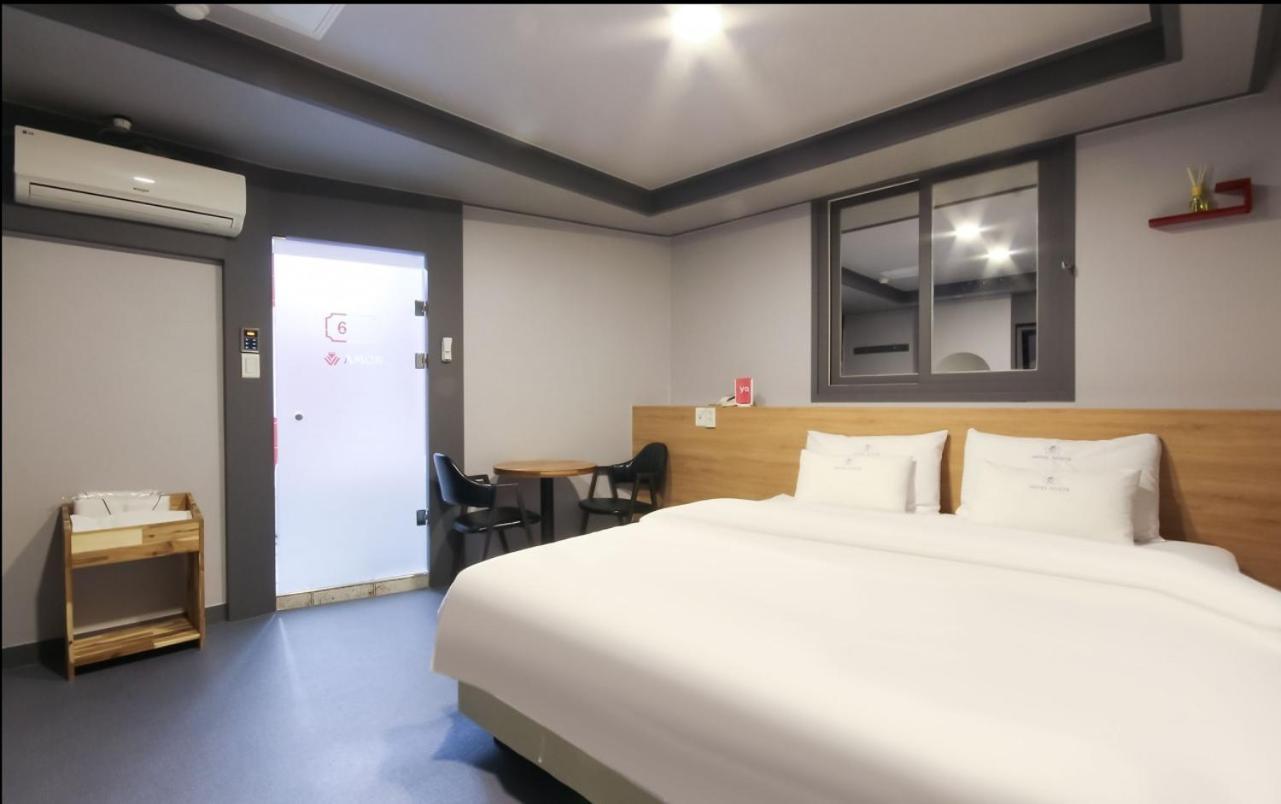 Amor Hotel Gimhae Bagian luar foto